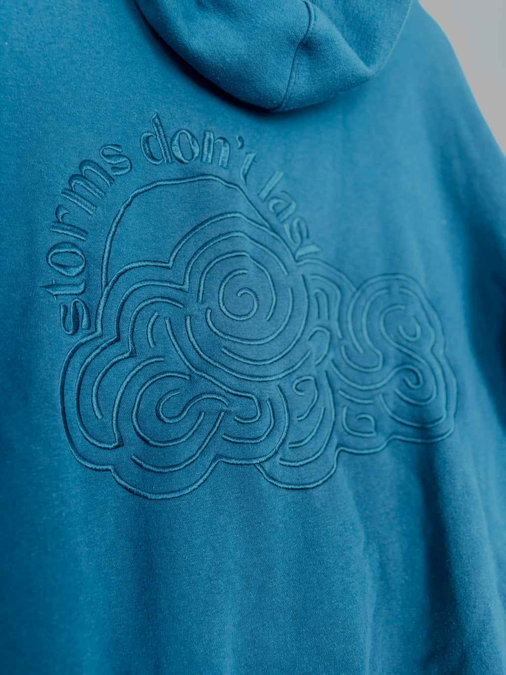 Storms Don't Last Hoodie Dark Cyan