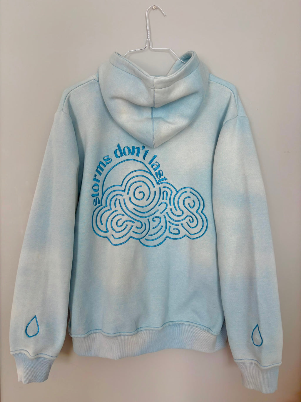 Storms Don't Last Hoodie Light Blue Sunfade