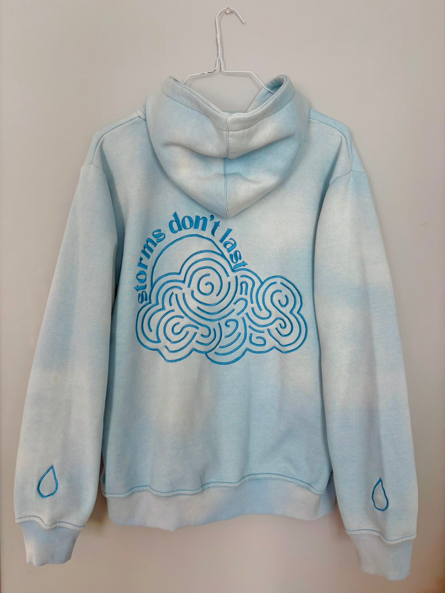 Storms Don't Last Hoodie Light Blue Sunfade