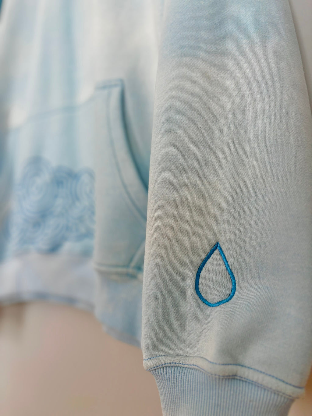 Storms Don't Last Hoodie Light Blue Sunfade