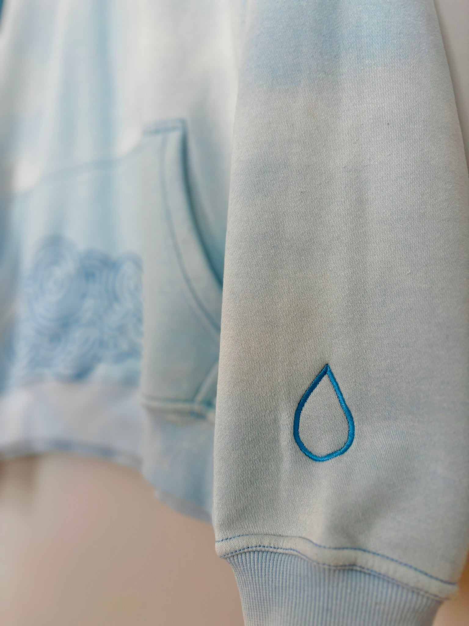 Storms Don't Last Hoodie Light Blue Sunfade